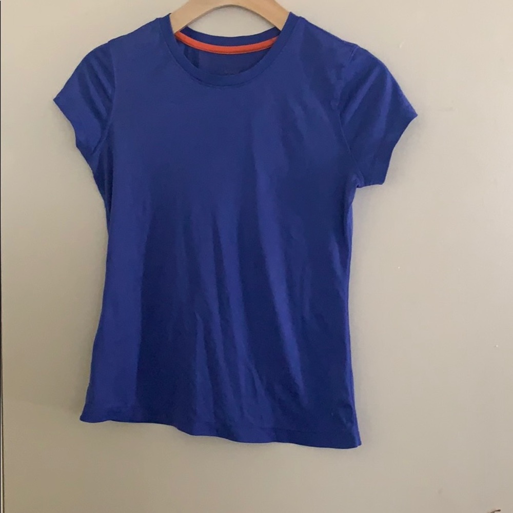 purple athletic shirt.